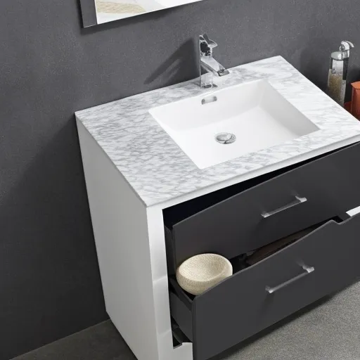 

A modern white vanity unit with a marble countertop and multiple drawers, perfect for organizing your bathroom essentials.